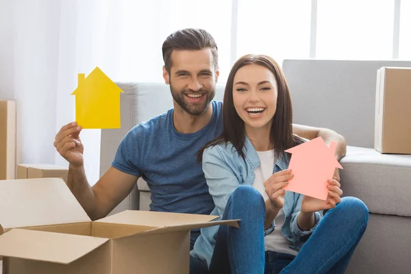 Young couple moving to a new apartment together relocation
