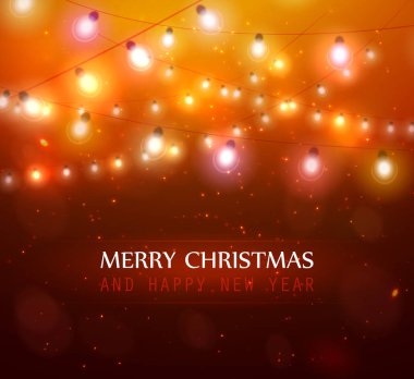 Renkli parlayan Noel turuncu ışıklar.