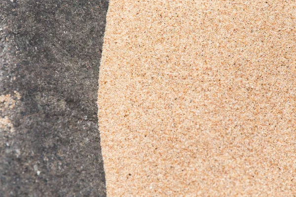 Um fundo abstrato de uma areia do mar e formas de rocha. Profundidade de campo rasa . — Fotografia de Stock