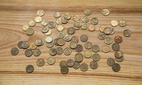 Old soviet coins on a wooden background — Stock Photo, Image