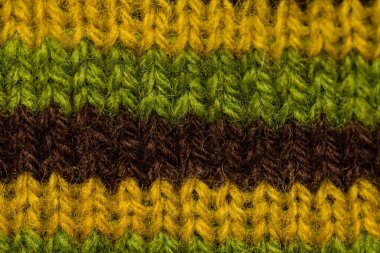 Bir el örme sıcak ve yumuşak yün desen güzel bir portre. Yumuşak çorap ya da doğal yün atkı. Renkli desen.