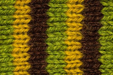 Bir el örme sıcak ve yumuşak yün desen güzel bir portre. Yumuşak çorap ya da doğal yün atkı. Renkli desen.