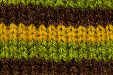 Bir el örme sıcak ve yumuşak yün desen güzel bir portre. Yumuşak çorap ya da doğal yün atkı. Renkli desen.