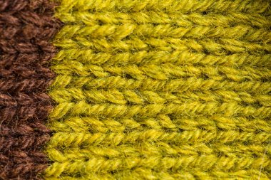 Bir el örme sıcak ve yumuşak yün desen güzel bir portre. Yumuşak çorap ya da doğal yün atkı. Renkli desen.