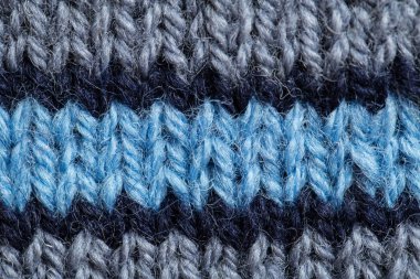 Bir el örme sıcak ve yumuşak yün desen güzel bir portre. Yumuşak çorap ya da doğal yün atkı. Renkli desen.