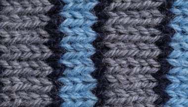 Bir el örme sıcak ve yumuşak yün desen güzel bir portre. Yumuşak çorap ya da doğal yün atkı. Renkli desen.