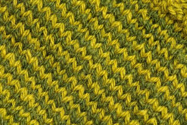 Bir el örme sıcak ve yumuşak yün desen güzel bir portre. Yumuşak çorap ya da doğal yün atkı. Renkli desen.