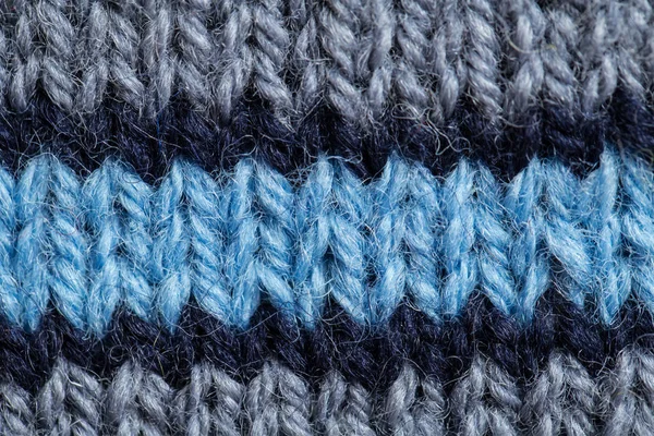 Bir el örme sıcak ve yumuşak yün desen güzel bir portre. Yumuşak çorap ya da doğal yün atkı. Renkli desen.