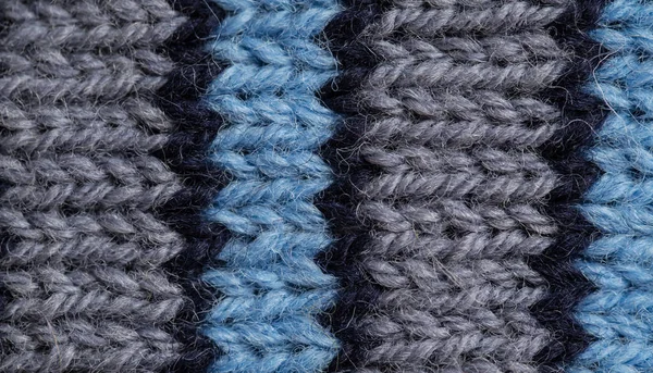 Bir el örme sıcak ve yumuşak yün desen güzel bir portre. Yumuşak çorap ya da doğal yün atkı. Renkli desen.