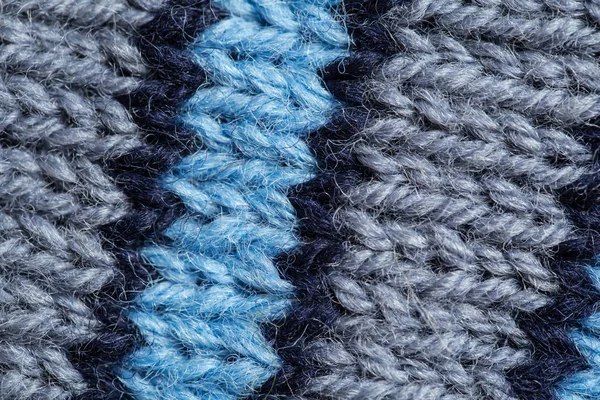 Bir el örme sıcak ve yumuşak yün desen güzel bir portre. Yumuşak çorap ya da doğal yün atkı. Renkli desen.