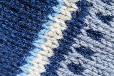 Bir el örme sıcak ve yumuşak yün desen güzel bir portre. Yumuşak çorap ya da doğal yün atkı. Renkli desen.