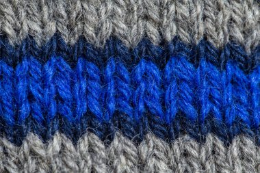 Bir el örme sıcak ve yumuşak yün desen güzel bir portre. Yumuşak çorap ya da doğal yün atkı. Renkli desen.