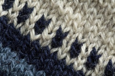 Bir el örme sıcak ve yumuşak yün desen güzel bir portre. Yumuşak çorap ya da doğal yün atkı. Renkli desen.