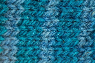 Bir el örme sıcak ve yumuşak yün desen güzel bir portre. Yumuşak çorap ya da doğal yün atkı. Renkli desen.