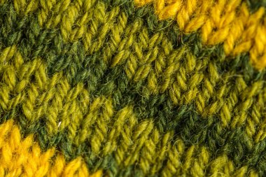 Bir el örme sıcak ve yumuşak yün desen güzel bir portre. Yumuşak çorap ya da doğal yün atkı. Renkli desen.