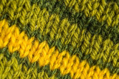 Bir el örme sıcak ve yumuşak yün desen güzel bir portre. Yumuşak çorap ya da doğal yün atkı. Renkli desen.