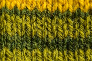 Bir el örme sıcak ve yumuşak yün desen güzel bir portre. Yumuşak çorap ya da doğal yün atkı. Renkli desen.