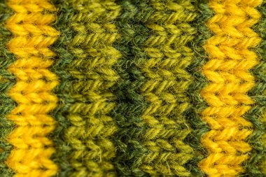 Bir el örme sıcak ve yumuşak yün desen güzel bir portre. Yumuşak çorap ya da doğal yün atkı. Renkli desen.