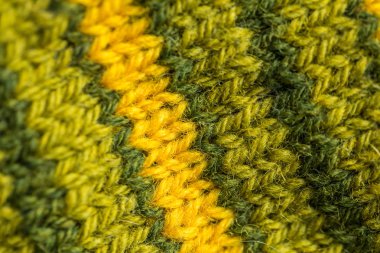 Bir el örme sıcak ve yumuşak yün desen güzel bir portre. Yumuşak çorap ya da doğal yün atkı. Renkli desen.