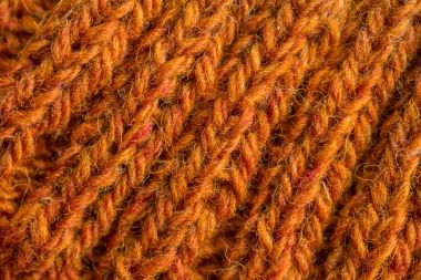 Bir el örme sıcak ve yumuşak yün desen güzel bir portre. Yumuşak çorap ya da doğal yün atkı. Renkli desen.