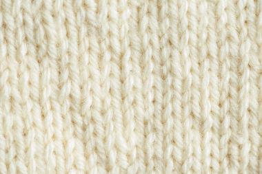 Bir el örme sıcak ve yumuşak yün desen güzel bir portre. Yumuşak çorap ya da doğal yün atkı. Renkli desen.