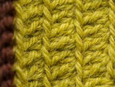 Güzel bir portre renkli yün iplik bir el yapımı tığ işi desen. Yumuşak ve sıcak doğal koyun yün. Desen yün.