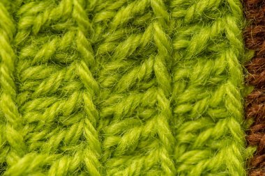 Güzel bir portre renkli yün iplik bir el yapımı tığ işi desen. Yumuşak ve sıcak doğal koyun yün. Desen yün.