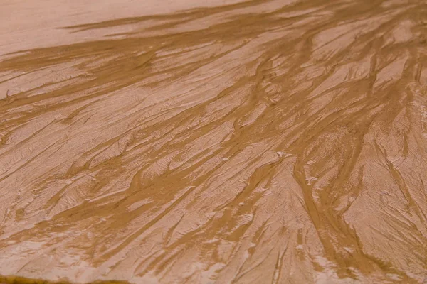 Güzel deniz kum desen bir plajda. Baltık Denizi kıyısında kum doku. Güzel bir kumlu desen arka planı için.