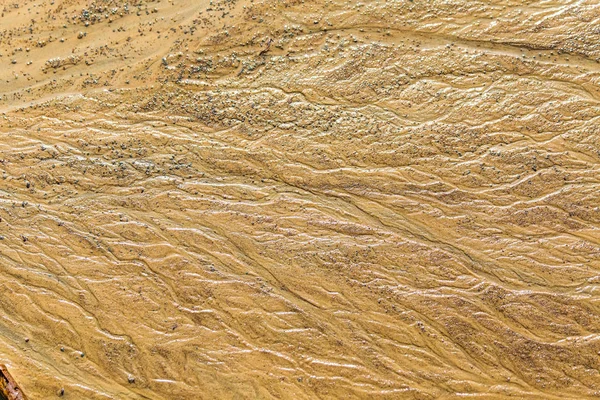 Güzel kum desenler Baltık Denizi kıyısında. Soyut, renkli arka plan kum plaj. Sığ derinlik-in tarla.