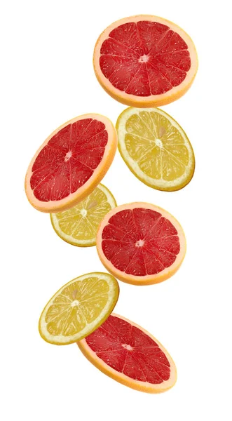 Řezy z grapefruitu a citronu izolovaných na bílém pozadí. — Stock fotografie