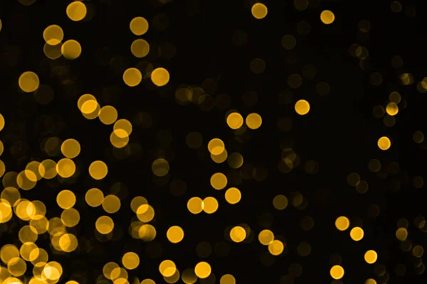 Złote musujące rastrowe tło świąteczne. Bokeh światła z jasnym błyszczącym efektem ilustracji. Zachodzące na siebie błyszczące i błyszczące plamy dekoracyjne tło. Abstrakcyjne kręgi błyszczące. — Zdjęcie stockowe