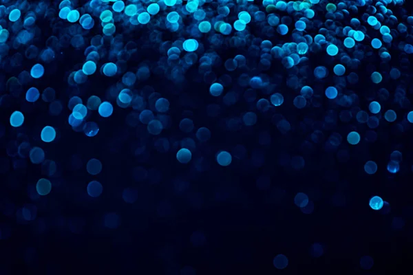 Bright blue glitter raster festive background. Abstract shimmering circles decorative backdrop. Bokeh lights with shiny effect illustration. Overlapping glowing and twinkling spots. — Stock Photo, Image