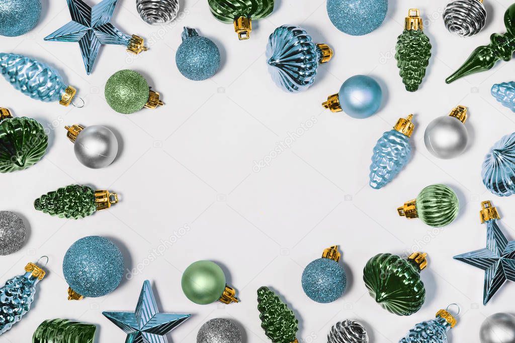 Christmas baubles round frame. Vintage glass winter holiday decorations. Xmas pine cones, stars festive border. Old fashioned blue, green and silver ornaments with copyspace. New Year backdrop.