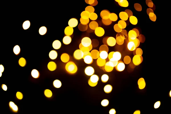 Золотой блеск растровый праздничный фон. Bokeh огни с ярким блеском эффект иллюстрации. Накладывающиеся светящиеся и мерцающие пятна декоративного фона. Абстрактные сверкающие круги . — стоковое фото