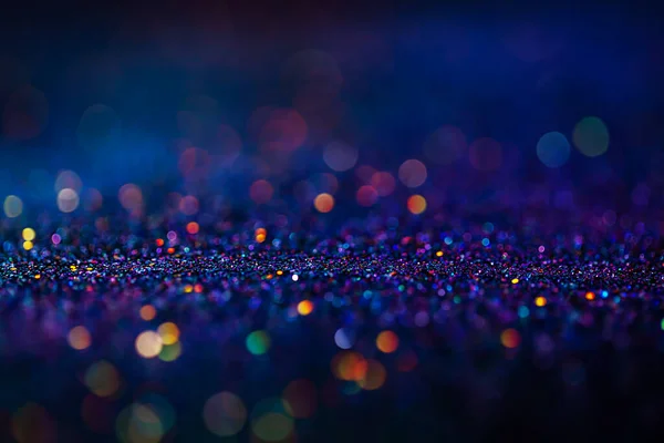 Shiny multicolor glitter raster background. Abstract shimmering pink, blue, yellow circles decorative backdrop. Bokeh lights effect illustration. Overlapping glowing and twinkling spots. — Stock Photo, Image