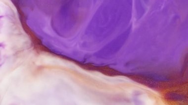 Motion mixed colorful acrylic. Liquid paint patterns of moving surface. Abstract mixture paint with flow metamorphosis. Golden, purple and white acrylic flow animation. Marble effect painting.