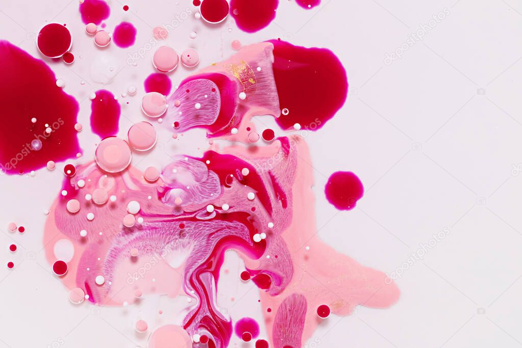 Fluid art texture. Backdrop with abstract iridescent paint effect. Liquid acrylic artwork with flows and splashes. Mixed paints for interior poster. Pink, white and ruby overflowing colors.