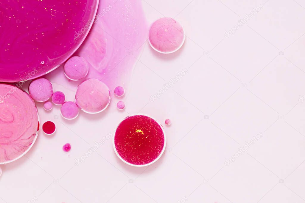 Fluid art texture. Background with abstract mixing paint effect. Liquid acrylic artwork with flows and splashes. Mixed paints for background or poster. Pink, white and ruby overflowing colors.