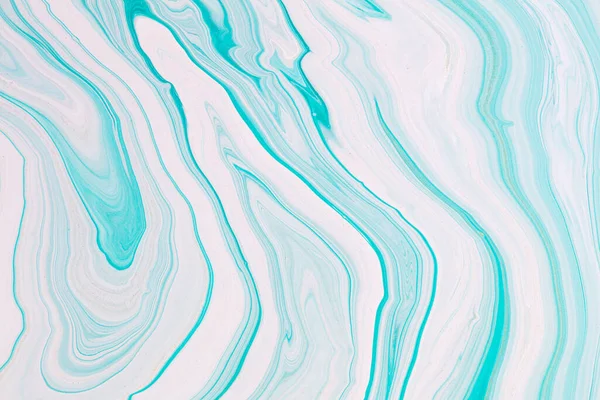 Fluid art texture. Abstract backdrop with mixing paint effect. Liquid acrylic picture that flows and splashes. Mixed paints for background or poster. Mint and white overflowing colors.