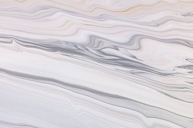 Sıvı sanat dokusu. Soyut karıştırıcı boya efektli bir arka plan. Akıp sıçrayan sıvı akrilik sanat eserleri. Arka plan ya da poster için karışık boyalar. Kahverengi, gri ve beyaz taşan renkler.