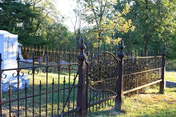 Fencing around family grave site — Stock Photo, Image