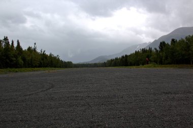 Alaska runway between the mountains