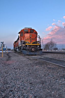 Colorful early morning catches a train waiting for the next load