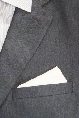 İş erkekler takım. Cebinde bir beyaz fuları var. Bir sembolü