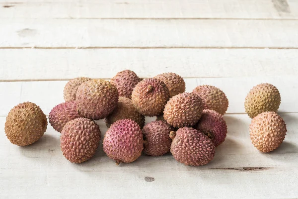 litchi fruit tropical on a wooden background, delicious food