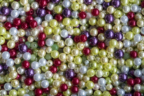 Contas multicoloridas close-up. Contexto e textura — Fotografia de Stock
