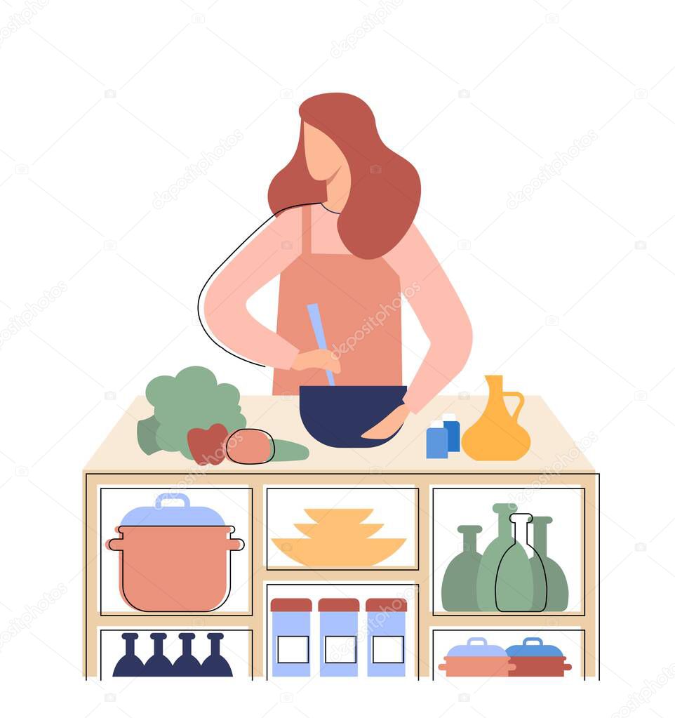 The girl prepares healthy food in the kitchen. A woman cooking a salad