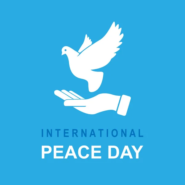 Banner Mezinárodního dne míru. Holubice v ruce s textem Mezinárodní den míru. Vektorová ilustrace. Eps 10 — Stockový vektor