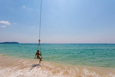 Girl on swing Koh Kood