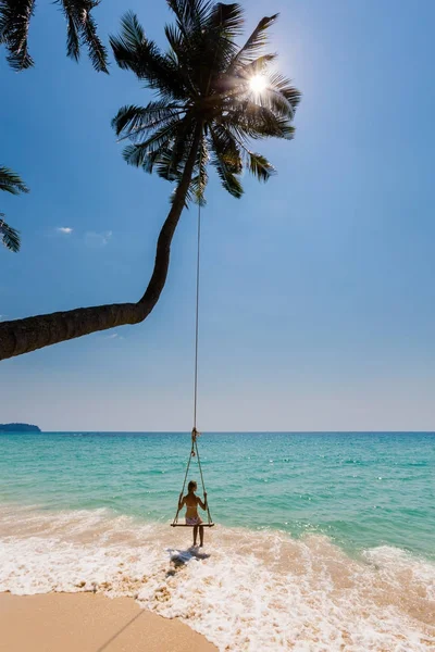 Girl on swing Koh Kood Royalty Free Stock Images